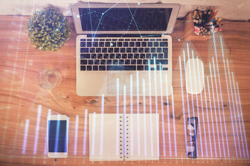 Multi exposure of financial chart drawing over table background with computer. Concept of research. Top view.
