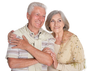 Happy senior couple hugging isolated on white background