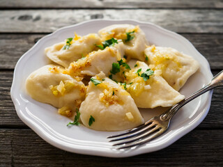 Dumplings - cheese noodles with onion
