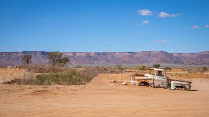 Abandoned car in the Namibian desert.