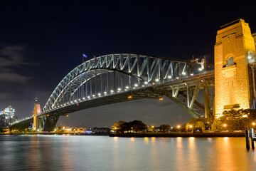 Fototapeta na wymiar Sydney, New South Wales, Australia ; The Sydney Harbor Bridge illuminated at night.