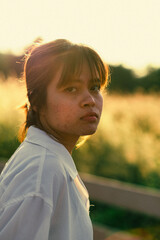 portrait of a child in a field