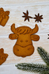 creative idea of christmas food, festive cookies shaped cow or bull, 2021 concept