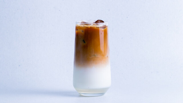 Delicious iced latte on a white background.