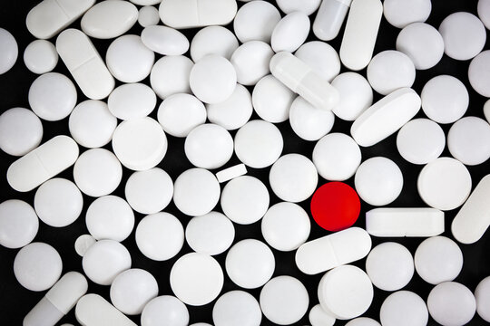 one red pill among the white pills. the view from the top © Кристина Пахомова