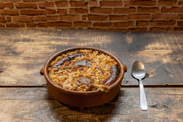 French specialty: cassoulet, a meal with white beans, duck leg, sausage and bacon