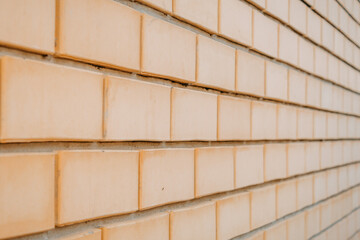 the texture of the beige brick wall