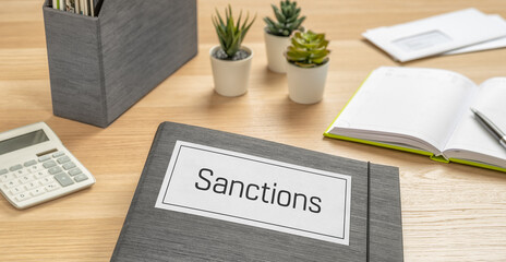 A folder on a desk with the label Sanctions
