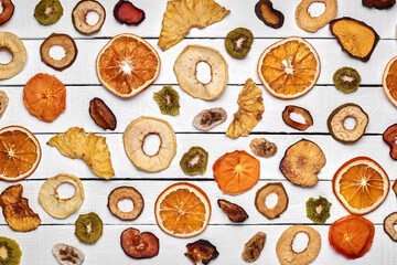 Mix of dried fruits on a wooden table