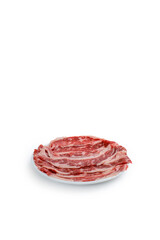 Fresh beef short plate slice on black plate, isolated on white background