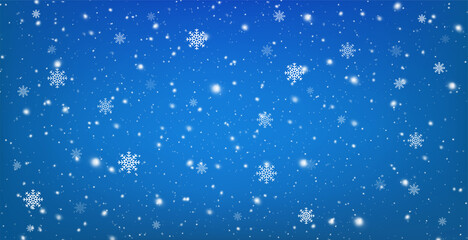 Snowy blue background with falling snowflakes. Christmas winter snowfall with white snow flakes.