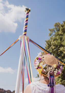 Traditional English maypole dancing.