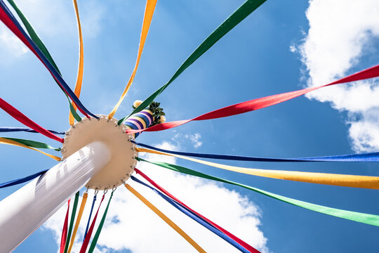 Coloured ribbons on an English maypole.