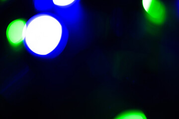 Abstract bokeh background wallpaper. colorful lights on a black background