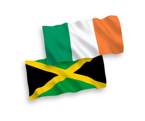 National vector fabric wave flags of Ireland and Jamaica isolated on white background. 1 to 2 proportion.