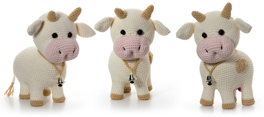 White bull on a white background. Knitted toy. Three position. Full depth of field. With clipping...