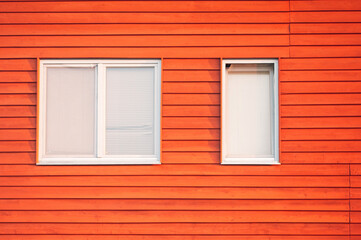 window with red shutters