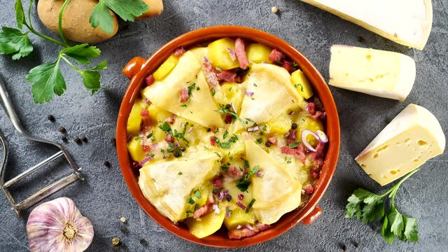 tartiflette, baked potato with bacon and cheese