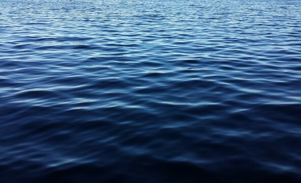 Beautiful dark blue water surface with ripples in Florida lake
