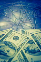 Fototapeta na wymiar horoscope with zodiac signs and money US dollars like astrology and money and astrology and wealth concept