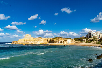 Xwejni Bay in Gozo with the Qolla l-Bajda (the White Hillock) in the background.