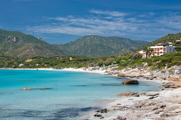 crystal clear water and granite rocks at Del Riso beach in Villasimius