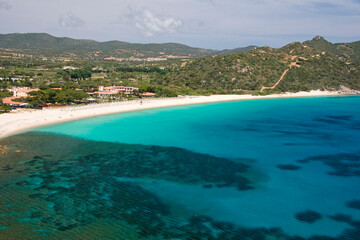 Fototapeta na wymiar crystal clear water and Mediterranean vegetation in Campus beach, Villasimius
