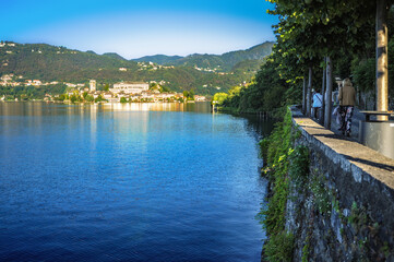 The old town of Orta San Giulio is located on the coast of Lake Lago d, Orta opposite the island of San Giulio. The medieval monastery on the island is the main Shrine and attraction of the town.     
