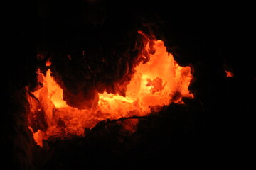 Fototapeta na wymiar Incandescent fires in a long-burning boiler Gorenje