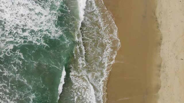 Drone footage of Beach waves coming onto shore of Tranquebar Tamil Nadu Chennai