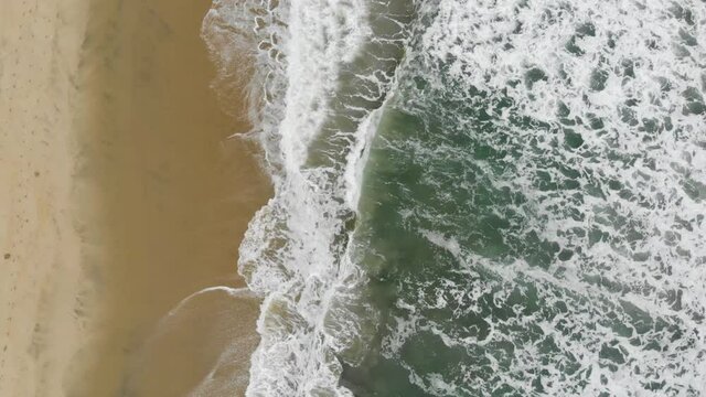 Drone footage of Beach waves coming onto shore of Tranquebar Tamil Nadu Chennai