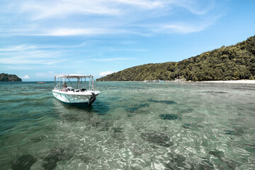 Boat on small island in Sabah, Malaysia.
