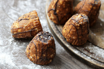 Chocolate cakes on a wooden Board