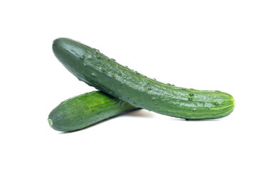 Green cucumbers on white background