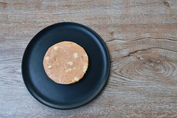 pork bologna stuffed cheese on dish in white background