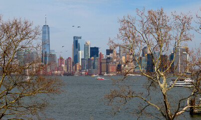 Fototapeta premium Cityscape of the financial district of Manhattan from Liberty Island