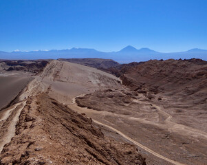Fototapeta na wymiar Lonely trail on dune in valley of the moon, Atacama salt desert, Chile