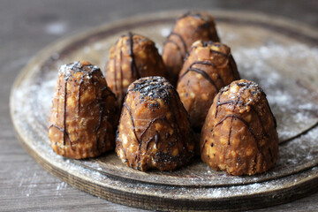 Chocolate cakes on a wooden Board