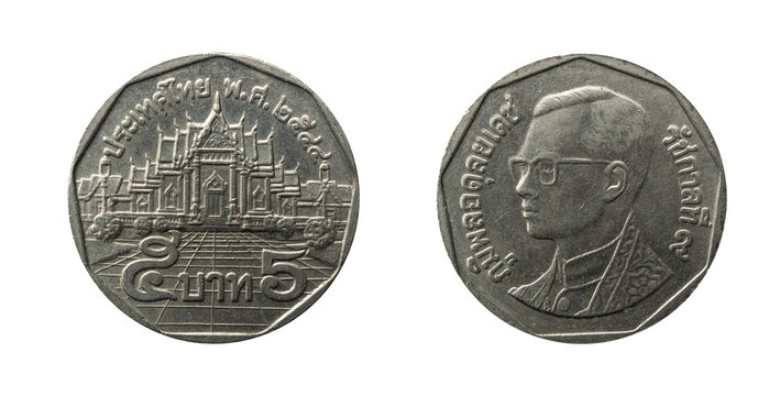 5 Baht coin from Thailand with the Wat Benchamabophit, also known as &ldquo;The Marble Temple&rdquo; and Rama IX on it.