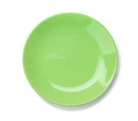 empty round green plate for main courses isolated on white background