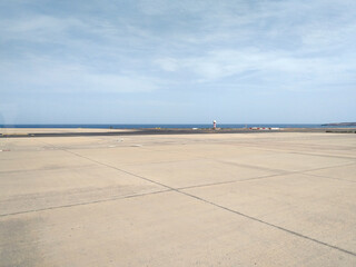 Runway, Airport pavement close up. Seaside airport runway background. View to empty airport runway....