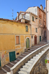 A narrow street with among the old houses of Rivello, a medieval village in the Basilicata region.