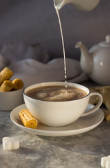 milk, milkman, tea, coffee, waffles, sweet, tea steam, pours, drops, splashes, cup, drink, breakfast, food, hot, white, beverage, cafe, spoon, brown, espresso, morning, table, caffeine, cream, bowl, s