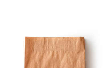 Empty brown paper grocery shopping bag top view isolated on white background
