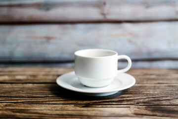 Chrysanthemum  tea in cup over the  old wooden table background . selective focus