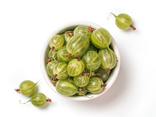 View from above of ripe green gooseberry in small bowl on white background. Organic gooseberries isolated on white with clipping path. Top view or flat lay. Copy space for text