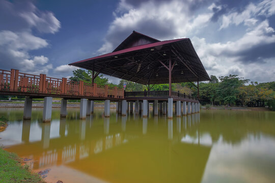 A long exposure picture of Traditional house at the lake in Joho