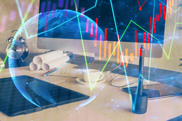 Financial market graph hologram and personal computer on background. Multi exposure. Concept of forex.