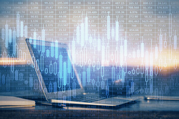 Financial graph colorful drawing and table with computer on background. Double exposure. Concept of...
