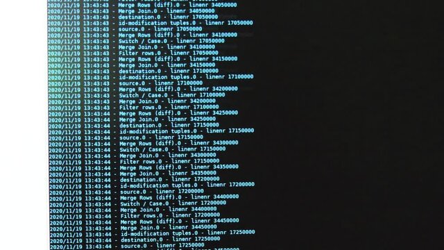 Azure computer software code moving on a black monitor. Computer hacking in process, dynamic text running and flowing on pc screen.